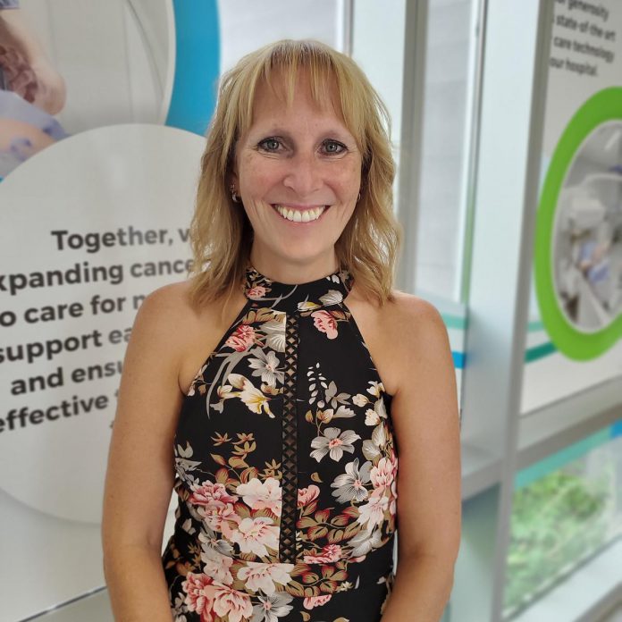 Jennie Ireland in the entry way to the Peterborough Regional Health Centre (PRHC) Radiation Centre. Seven years ago, Ireland's life changed when she was diagnosed with breast cancer. As a single mother with aging parents, receiving treatment close to home was extremely important to her. In her ambassador role, she regularly acts as a voice for the PRHC Foundation, speaking at third-party events, at fundraisers, and to fellow donors. (Photo courtesy of PRHC Foundation)