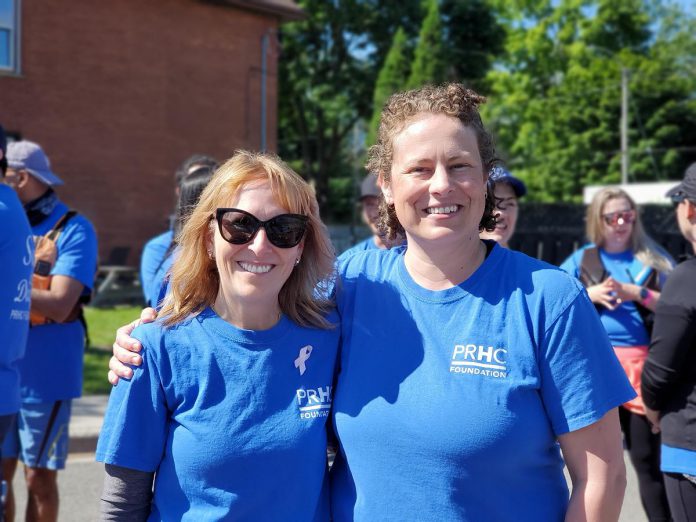 Breast cancer survivor Jennie Ireland (left) with Valerie Gagnon, Charitable Giving Advisor with the Peterborough Regional Health Centre (PRHC) Foundation, at Peterborough's Dragon Boat Festival, which has raised more than $4.5 million for cancer care at PRHC since 2021. Ireland continues to be a PRHC Foundation ambassador, supporting the PRHC Foundation's $60 million Campaign for PRHC by sharing her story. (Photo courtesy of PRHC Foundation)  