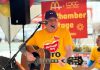 Lindsay & District Chamber of Commerce executive director Terry Guiel performing on the "McChamber Stage" in support of the McDonalds restaurant in Lindsay during McHappy Day on May 8, 2024. Over the past year, the Peterborough resident has embraced his role as champion of the chamber's 275-plus members, meeting with local businesses and increasing the membership by 25 per cent, generating $80,000 in grants and sponsorships, and making the chamber more visible in the community. (Photo courtesy of Terry Guiel)