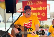 Lindsay & District Chamber of Commerce executive director Terry Guiel performing on the "McChamber Stage" in support of the McDonalds restaurant in Lindsay during McHappy Day on May 8, 2024. Over the past year, the Peterborough resident has embraced his role as champion of the chamber's 275-plus members, meeting with local businesses and increasing the membership by 25 per cent, generating $80,000 in grants and sponsorships, and making the chamber more visible in the community. (Photo courtesy of Terry Guiel)