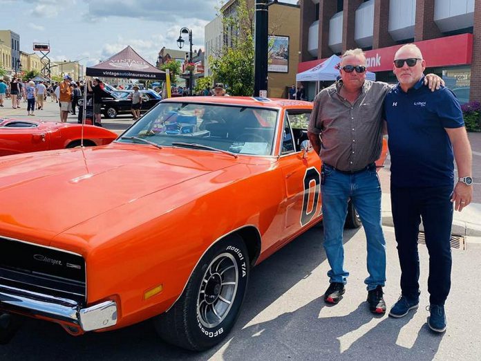 Lindsay & District Chamber of Commerce executive director Terry Guiel with Kawartha Lakes Community Futures executive director and Invest Kawartha CEO Vince Killen during the annual Classics on Kent car show in downtown Lindsay on July 21, 2024. (Photo courtesy of Terry Guiel)