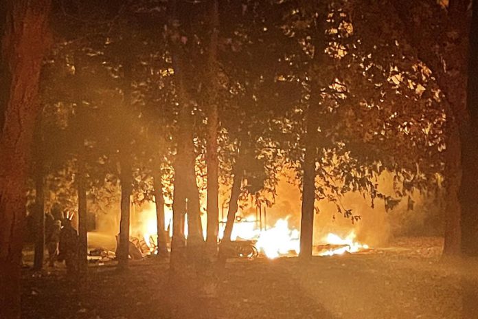 A resident and their pet were able to escape without injury from this tent encampment in the Bond St. area of Lindsay after a fire on November 1, 2024 that Kawartha Lakes police believe was deliberately set. (Photo supplied by Kawartha Lakes Police Service)