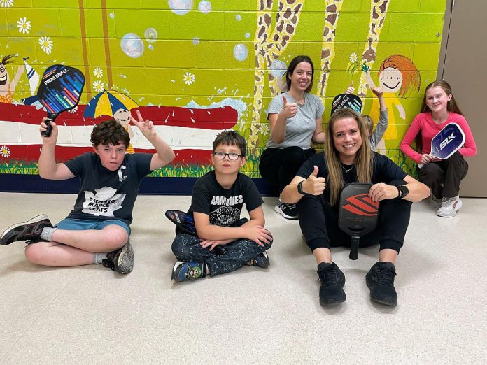 It's pickleball for all at Five Counties Children's Centre, as Peterborough pro pickleball player, coach, and consultant Jennie Davis (front right) has been assisting Five Counties recreation therapy staff like Caitlin Ivany (rear left) give children of all abilities a chance to try out the sport. (Photo courtesy of Five Counties Children's Centre)