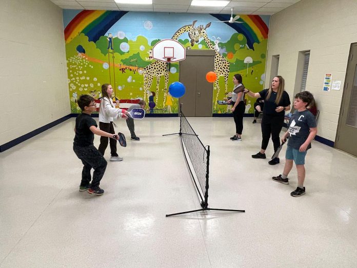 Balls were swapped out with balloons during the Pickleball for All program at Five Counties Children's Centre in November to give participants the chance to build confidence in using and hitting with a pickleball racquet. (Photo courtesy of Five Counties Children's Centre)