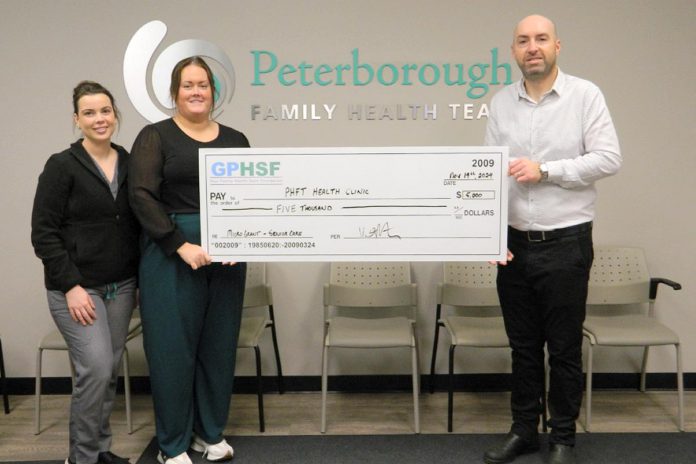 The Peterborough Family Health Team (PFHT) and Community Care Peterborough are the inaugural recipients of the new senior care micro grant program administered by the Greater Peterborough Health Services Foundation (GPHSF). Pictured is GPHSF executive director Vince Bierworth (right) presenting a $5,000 cheque to PFHT health clinic medical officer Alexis Leroux and patient services supervisor Amber Brown on November 14, 2024. PFHT will use the grant to increase ease and access to care for seniors who do not have a family doctor and are using one of the two PFHT's unattached patient clinics. (Photo courtesy of GPHSF)