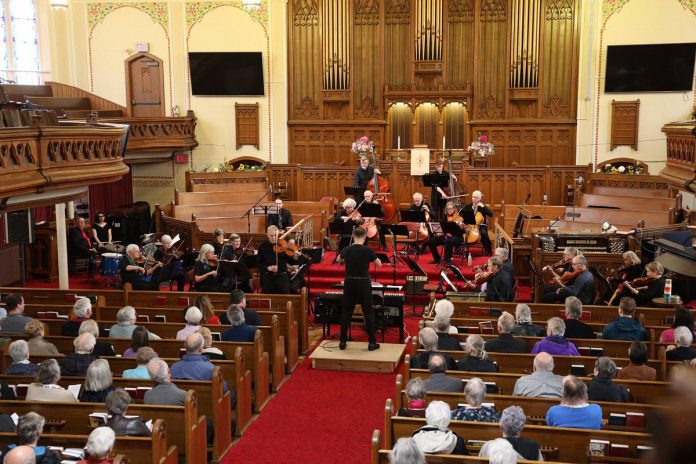 The Kawartha String Orchestra in performance at its spring 2024 concert. For its annual winter concert on November 24, 2024, the community orchestra will be playing Purcell, Vivaldi, music from "Home Alone, and festival holiday tunes under the theme "Christmas, Seasons". With special guests Marcus Quin and Tak Twan, the concert will be accepting monetary donations to Kawartha Food Share. (Photo: Doug Haskell)