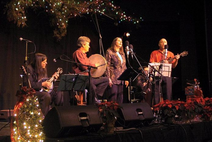 Michael Ketemer and Carried Away (Rob Fortin, Susan Newman, and John Hoffman) performing 20 years ago at the 2004 In From The Cold concert at Market Hall Performing Arts Centre in downtown Peterborough. (Photo: Jeannine Taylor)