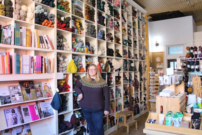 A passionate knitter herself, Deanna Guttman has owned Needles in the Hay at 385 Water Street in downtown Peterborough since 2016. The shop sells only top-quality, all-natural yarns in a myriad of colours and offers a place for fibre enthusiasts to connect in the educational space above the shop called The Hayloft. From November 29 to December 2, 2024, Needles in the Hay is running their annual Black Friday Sale, providing savings on top-selling brands and clearance items, and giving out two times the points on all purchases to Needle Point members. (Photo courtesy of Needles in the Hay)