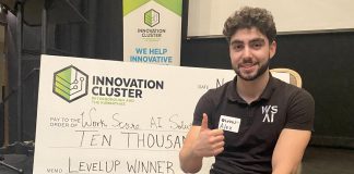 Alex Bilyan, chief sales officer and co-founder of WorkScore.ai, was the winner of $10,000 at the Innovation Cluster's LevelUP Pitch Competition at Market Hall Performing Arts Centre in downtown Peterborough on November 6, 2024. WorkScore.ai is an platform powered by artificial intelligence and smart wristbands for warehouse workers that identifies inefficiencies in warehouse operations. (Photo: Paul Rellinger / kawarthaNOW)