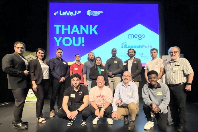 The 10 entrepreneurs (along with their supporters) who participated in the Innovation Cluster's LevelUP Pitch Competition at Market Hall Performing Arts Centre in downtown Peterborough on November 6, 2024. (Photo: Paul Rellinger / kawarthaNOW)