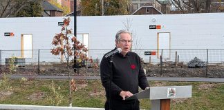 Peterborough Mayor Jeff Leal announced the release of the 15-recommendation report of the Mayor's Task Force for Housing Creation at a media event on November 5, 2024 in front of of Ashburnham Realty's six-storey building currently under construction along the Rotary Greenway Trail just north of Robinson Street in Peterborough's East City. (Photo: Bruce Head / kawarthaNOW)