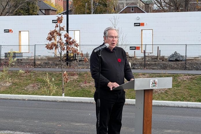 Peterborough Mayor Jeff Leal announced the release of the 15-recommendation report of the Mayor's Task Force for Housing Creation at a media event on November 5, 2024 in front of of Ashburnham Realty's six-storey building currently under construction along the Rotary Greenway Trail just north of Robinson Street in Peterborough's East City. (Photo: Bruce Head / kawarthaNOW)