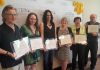 The six recipients of the inaugural Peterborough Arts Awards (Robert Winslow, Melody Thomas, Leanne Betasamosake Simpson, Krista English, Beth McMaster, and Brad Brackenridge) on May 25, 2018. After a five-year hiatus due to the pandemic, the awards are returning for 2024 with nominations open until December 16. The awards will be presented on February 13, 2025 at The Mayor's Luncheon for the Arts at The Canadian Canoe Museum in Peterborough. (Photo: Jeannine Taylor / kawarthaNOW)