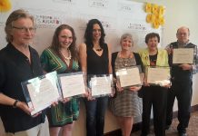 The six recipients of the inaugural Peterborough Arts Awards (Robert Winslow, Melody Thomas, Leanne Betasamosake Simpson, Krista English, Beth McMaster, and Brad Brackenridge) on May 25, 2018. After a five-year hiatus due to the pandemic, the awards are returning for 2024 with nominations open until December 16. The awards will be presented on February 13, 2025 at The Mayor's Luncheon for the Arts at The Canadian Canoe Museum in Peterborough. (Photo: Jeannine Taylor / kawarthaNOW)