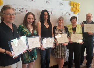 The six recipients of the inaugural Peterborough Arts Awards (Robert Winslow, Melody Thomas, Leanne Betasamosake Simpson, Krista English, Beth McMaster, and Brad Brackenridge) on May 25, 2018. After a five-year hiatus due to the pandemic, the awards are returning for 2024 with nominations open until December 16. The awards will be presented on February 13, 2025 at The Mayor's Luncheon for the Arts at The Canadian Canoe Museum in Peterborough. (Photo: Jeannine Taylor / kawarthaNOW)