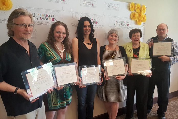 The six recipients of the inaugural Peterborough Arts Awards (Robert Winslow, Melody Thomas, Leanne Betasamosake Simpson, Krista English, Beth McMaster, and Brad Brackenridge) on May 25, 2018. After a five-year hiatus due to the pandemic, the awards are returning for 2024 with nominations open until December 16. The awards will be presented on February 13, 2025 at The Mayor's Luncheon for the Arts at The Canadian Canoe Museum in Peterborough. (Photo: Jeannine Taylor / kawarthaNOW)