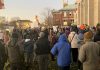 Around 400 people gathered outside Peterborough City Hall on November 12, 2024 to protest a proposed 25 per cent across-the-board cut in the City of Peterborough's 2025 draft budget to grants to community organizations. (Photo: Paul Rellinger / kawarthaNOW)