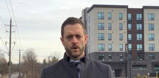 Detective sergeant Josh McGrath in a Peterborough Police Service video describing the incident on November 16, 2024 at the Hunt Terraces apartment building that resulted in the death of a 62-year-old Peterborough man who was a tenant in the building. A 38-year-old Peterborough man who is also a tenant in the building has been charged with second-degree murder. (kawarthaNOW screenshot)