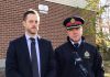 Detective sergeant Josh McGrath and deputy police chief Jamie Hartnett speak to the media on November 13, 2024 at the site of a shooting at 850 Fairbairn Street in Peterborough, where three male suspects fired multiple shots into the townhomes and into the air the previous night. No one was injured in the incident, which police believe is connected to the illicit drug trade. (kawarthaNOW screenshot of police video)