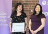 One City Peterborough's drop-in program coordinator Cheyenne Buck (left, pictured with Maryam Monsef), who was one of 20 local women who received a Women of Impact award from the United Way Peterborough & District in May 2024, is also being honoured with a Rebel with a Cause award from the Elizabeth Fry Society of Peterborough, along with Kelli Marshall and Jocelyn Enright, at a fundraising event at Showplace Performance Centre in downtown Peterborough on November 27, 2024. (Photo: United Way Peterborough & District)