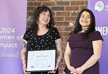 One City Peterborough's drop-in program coordinator Cheyenne Buck (left, pictured with Maryam Monsef), who was one of 20 local women who received a Women of Impact award from the United Way Peterborough & District in May 2024, is also being honoured with a Rebel with a Cause award from the Elizabeth Fry Society of Peterborough, along with Kelli Marshall and Jocelyn Enright, at a fundraising event at Showplace Performance Centre in downtown Peterborough on November 27, 2024. (Photo: United Way Peterborough & District)