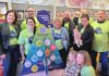 The Sharing Tree, an initiative to connect the community with Peterborough Regional Health Centre (PRHC) during the holiday season in support of the PRHC Foundation's $60-million Campaign for PRHC to reimagine healthcare at the regional hospital, was launched on November 23, 2024 at Couture Candy PTBO in downtown Peterborough. Pictured from left to right are PRHC Foundation president and CEO Lesley Heighway and reImagineers Lisa and Matt Couture, Susan Dunkley, Noah Crowley, Nick Beamish and his son Luke, Jess Crowley and her son Theo, Darryl Porter, and (in front) PRHC Foundation manager of community giving and engagement Jane Lovett with her son Sam. (Photo courtesy of PRHC foundation)