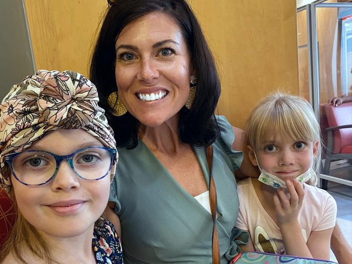 Brooke Roberts with her daughters Sofie (left) and Stella. Before Sofie passed away on May 17, 2024 from brain cancer at the age of nine, she told her mother she hoped her experience would help other families facing similar situations. That's why the family is partnering with Peterborough hair salon Hair by Fusion to raise funds for pediatric cancer care at Peterborough Regional Health Centre (PRHC). Until December 14, 2024, proceeds from all blow dries and select product sales will be donated to the PRHC Foundation and, for a $20 donation to the fundraiser, donors will have the chance to win one of four gift baskets. (Photo courtesy of the Roberts family)