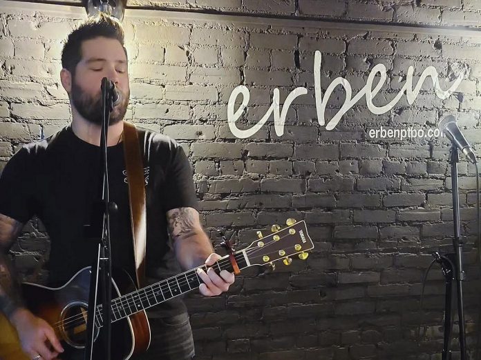 Musician Ty Wilson hosting an open mic at Erben Eatery & Bar in downtown Peterborough. Owner Belinda Scollick has announced the restaurant and live music venue, which opened at 379 George Street North in downtown Peterborough in February 2023, will be closing at the end of December 2024. (Photo: Erben / Instagram)