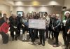 Members of 100 Women Peterborough presented a $10,000 cheque to Community Counselling and Resource Centre (CCRC) at the collective philanthropy group's fourth meeting of the year on December 10, 2024 at Ashburnham Funeral Home & Reception Centre in Peterborough. (Photo courtesy of 100 Women Peterborough)