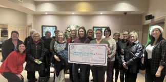 Members of 100 Women Peterborough presented a $10,000 cheque to Community Counselling and Resource Centre (CCRC) at the collective philanthropy group's fourth meeting of the year on December 10, 2024 at Ashburnham Funeral Home & Reception Centre in Peterborough. (Photo courtesy of 100 Women Peterborough)