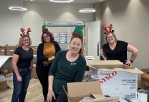 Community Care Peterborough staff members helping with the charitable organization's Meals to Go fundraiser on December 3, 2024. A total of 634 meals were donated for seniors and adults living with physical challenges throughout Peterborough and surrounding areas in December. (Photo courtesy of Community Care Peterborough)