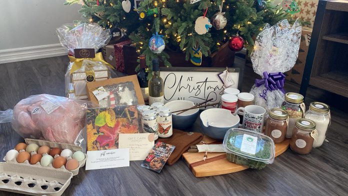 The gift bundle created in 2023 by Duff Acres co-owners Ashley Foreman and Chris Duff in partnership with local businesses. Members of the community can submit the names of families they believe could use a little extra cheer this holiday season. (Photo courtesy of Duff Acres)