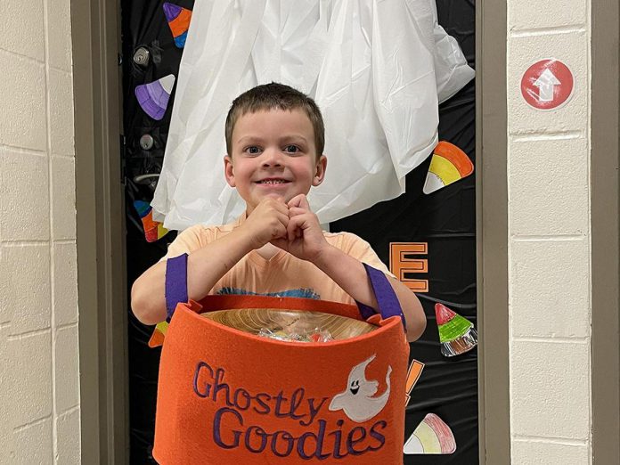 Four-year-old Christian getting ready to participate in the All-oween accessible trick-or-treating experience at Five Counties Children Centre, a free event for children and families who receive treatment at the centre or who are waiting for services. (Photo courtesy of Five Counties Children's Centre)