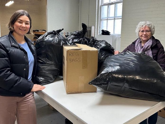 Jacquelyn Craft (left), owner of Peterborough's The Neighbourhood Vintage, donates bags of clothing to the Good Neighbours Care Centre. Operating since 1984, the charity relies on community donations to meet the demand for services, which has been growing since the pandemic and even more in early 2024 with inflation. (Photo courtesy of Good Neighbours Care Centre)