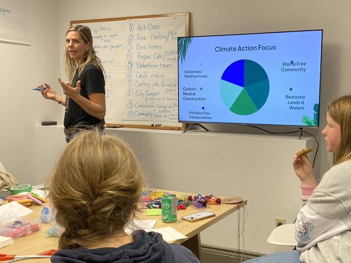 GreenUP education program coordinator Melissa Morris facilitates the first of GreenUP's Youth Climate Action sessions for female-identifying, two-spirit, and gender-diverse youth on October 9, 2024. The session engaged participants to contribute ideas to help co-design the rest of the workshop series. The areas that youth chose to focus on included sustainable gift giving, slow stitching, eco architecture, leadership and philanthropy, and a repair café. (Photo: Natalie Stephenson / GreenUP)