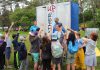 Excited children at the 2024 Peterborough Children's Water Festival volunteer for an opportunity to experience the "Lather Up" activity centre, which teaches students how they and their families can conserve water when showering. The festival is an annual event at the Riverview Park & Zoo that combines education, fun, and hands-on learning to teach children about the importance of water in their lives, empowering them to take action in their homes and communities to conserve and protect water. (Photo: Karen Halley)