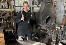 After more than 20 years as a volunteer and employee at Lang Pioneer Village Museum in Keene, museum operations coordinator Hailey Doughty discovered she is a descendent of Daniel Kidd, the blacksmith who worked in and built the blacksmith shop currently at the living history museum. The discovery inspired Doughty to take a blacksmith workshop alongside her father, which has ignited a new passion for the trade among the family's current generation. (Photo courtesy of Hailey Doughty)