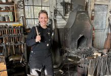 After more than 20 years as a volunteer and employee at Lang Pioneer Village Museum in Keene, museum operations coordinator Hailey Doughty discovered she is a descendent of Daniel Kidd, the blacksmith who worked in and built the blacksmith shop currently at the living history museum. The discovery inspired Doughty to take a blacksmith workshop alongside her father, which has ignited a new passion for the trade among the family's current generation. (Photo courtesy of Hailey Doughty)