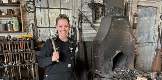 After more than 20 years as a volunteer and employee at Lang Pioneer Village Museum in Keene, museum operations coordinator Hailey Doughty discovered she is a descendent of Daniel Kidd, the blacksmith who worked in and built the blacksmith shop currently at the living history museum. The discovery inspired Doughty to take a blacksmith workshop alongside her father, which has ignited a new passion for the trade among the family's current generation. (Photo courtesy of Hailey Doughty)