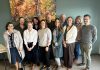 The senior leadership team of Peterborough Public Health and the Haliburton, Kawartha, Pine Ridge District Health Unit, including medical officers of health Dr. Thomas Piggot (front row, right) and Dr. Natalie Bocking (back row, left). The two health units have merged under the legal name Haliburton Kawartha Northumberland Peterborough Health Unit, bringing together over 300 public health professionals under a single entity. The first meeting of the new board of health for the merged health unit will be held virtually on January 2, 2025. (Photo: Haliburton Kawartha Northumberland Peterborough Health Unit)