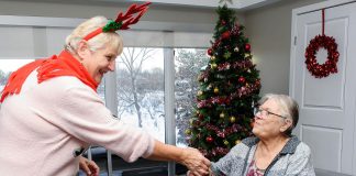 Lindsay Garden Club volunteers recently delivered more than 700 brightly coloured Kalanchoe plants, along with Christmas cards created by area schoolchildren, to residents of Kawartha Lakes long-term care homes. (Photo courtesy of Lindsay Garden Club)