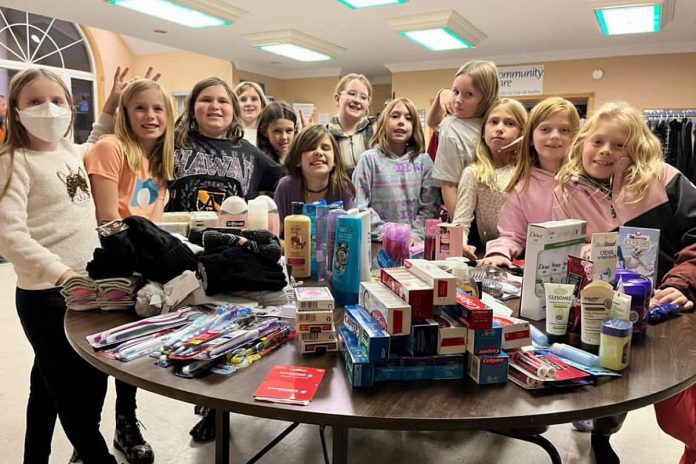 Members of the 1st Selwyn Girl Guides assembled and donated multiple gift-filled shoeboxes to the Kawartha Lakes chapter of The Shoebox Project for Women. (Photo courtesy of The Shoebox Project Kawartha Lakes)