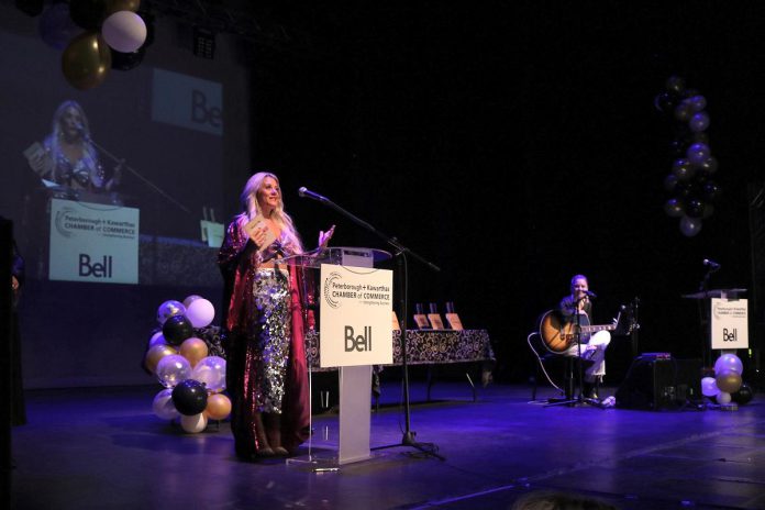 Ashley Flynn, CEO and lead designer of Black Rock Developments, accepting a "4 Under 40" award during the Peterborough and Kawarthas Chamber of Commerce's 2023 Business Excellence Awards. (Photo courtesy of Peterborough and Kawarthas Chamber of Commerce)