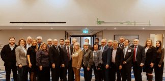 Peterborough County Warden Bonnie Clark (middle of front row, in light brown jacket) with members of the Eastern Ontario Wardens' Caucus (EOWC) along with Ontario government cabinet members and MPPs at EOWC's annual inaugural meeting in Kingston on January 9 and 10, 2025, when Clark was acclaimed as EOWC chair and Prince Edward County Mayor Steve Ferguson was elected as vice-chair. (Photo courtesy of EOWC)