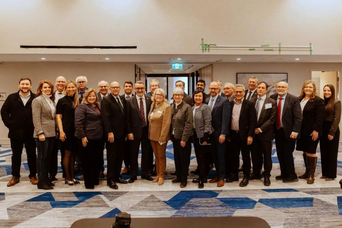 Peterborough County Warden Bonnie Clark (middle of front row, in light brown jacket) with members of the Eastern Ontario Wardens' Caucus (EOWC) along with Ontario government cabinet members and MPPs at EOWC's annual inaugural meeting in Kingston on January 9 and 10, 2025, when Clark was acclaimed as EOWC chair and Prince Edward County Mayor Steve Ferguson was elected as vice-chair. (Photo courtesy of EOWC)