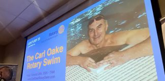 The late Carl Oake was remembered at the media launch of the 39th annual Carl Oake Rotary Swim at the offices of Baker Tilly KDN LLP in downtown Peterborough on January 6, 2025. The founder of the fundraiser for Easter Seals and projects supported by the Rotary Club of Peterborough, which takes place this year on February 28 at the Peterborough YMCA, passed away on January 2 at the age of 79. (Photo: Paul Rellinger / kawarthaNOW)