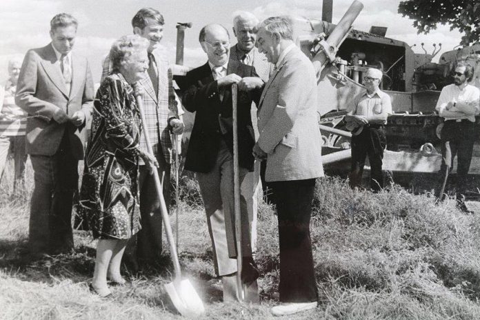 At the 1974 sod turning for the "new" Five Counties Children's Centre being built on Dutton Road in Peterborough, Mrs. J.H.C. Willoughby, the 100-year-old daughter of original property owner and former MP George Hillaire, joined Peterborough Mayor Phil Turner and Peterborough MPP John Turner for the event. Rotary Club members who inspired the project stand in the back row: director Ed Meyer, president Clair Hilborn, and director Carol Ciscoe. (Photo courtesy of Five Counties Children's Centre)