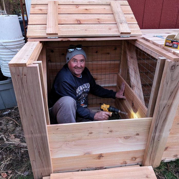 Building and repairing objects that can be used for a long time is an important priority for GreenUP executive director Tegan Moss' father Ric Moss. Here Ric is pictured constructing a compost bin that will be used for many years on Wildside urban farm in Kansas City, Missouri. (Photo: Tegan Moss)