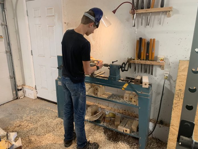 Cutting Edge Woodworking owner Isaiah Jalsevac works out of his family's garage in Millbrook. Since launching his business at the age of 11, the 15-year-old entrepreneur has been developing his skills and acquiring more tools. (Photo: Cutting Edge Woodworking / Facebook)