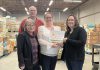 Lindsay-based non-profit food distribution organization Kawartha Lakes Food Source (KLFS) recently earned accreditation from Food Banks Canada. Pictured from left to right are past KLFS board chair Rose Barg, current KLFS board chair Kelland Sewell, KLFS executive director Heather Kirby, and Food Banks Canada representative Karen Alebon. (Photo courtesy of KLFS)